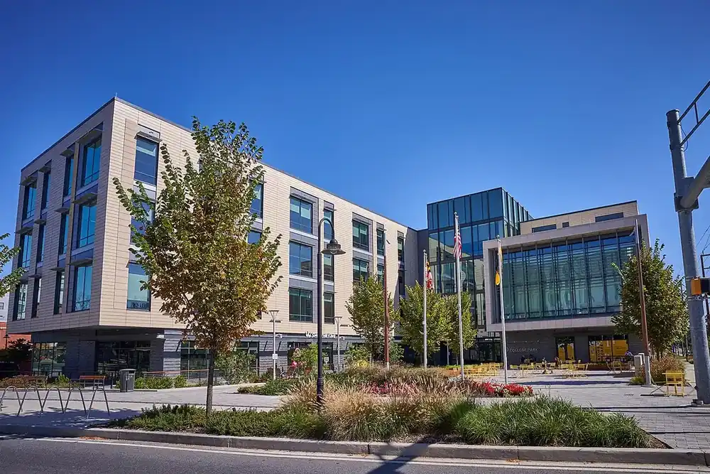 Modern glass and stone City Hall on a landscaped plaza in College Park, Maryland