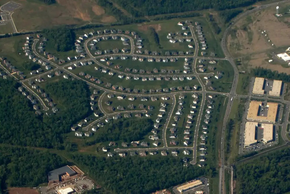 Aerial view of a curving housing subdivision in Loudoun Valley Estates, Virginia