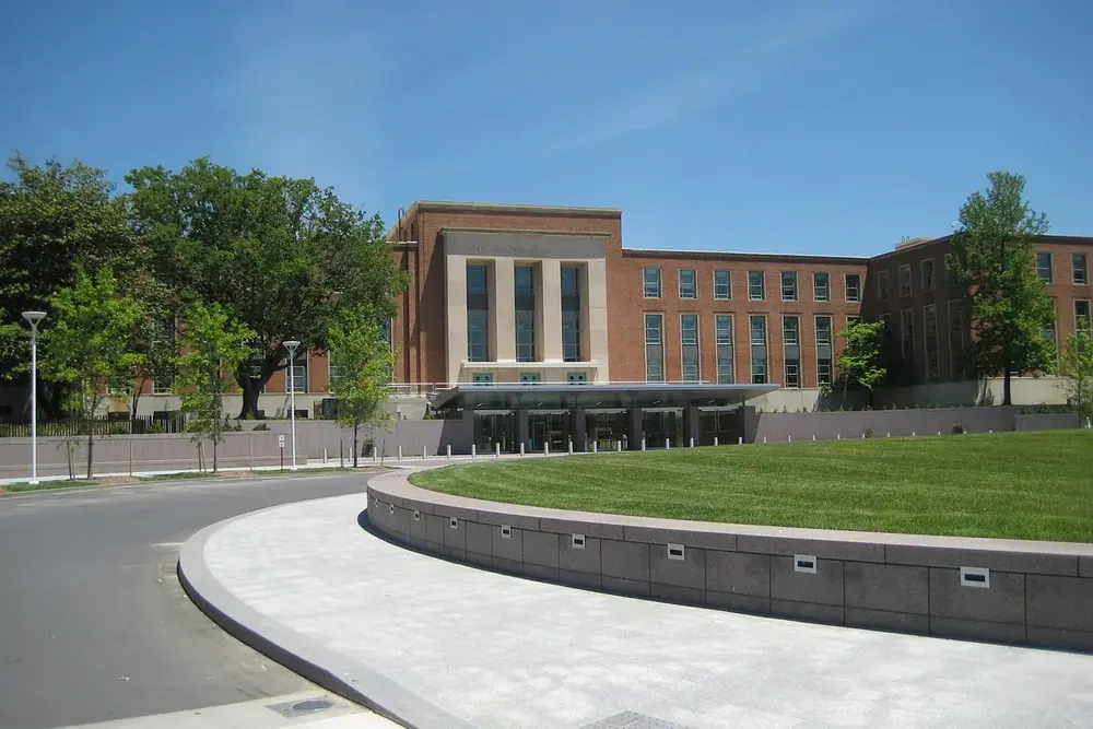 Brick headquarters building and landscaped circle on the federal research campus in White Oak, Maryland